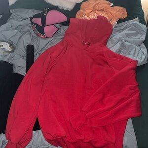 What size medium red pull over hoodie with balloons leaves
